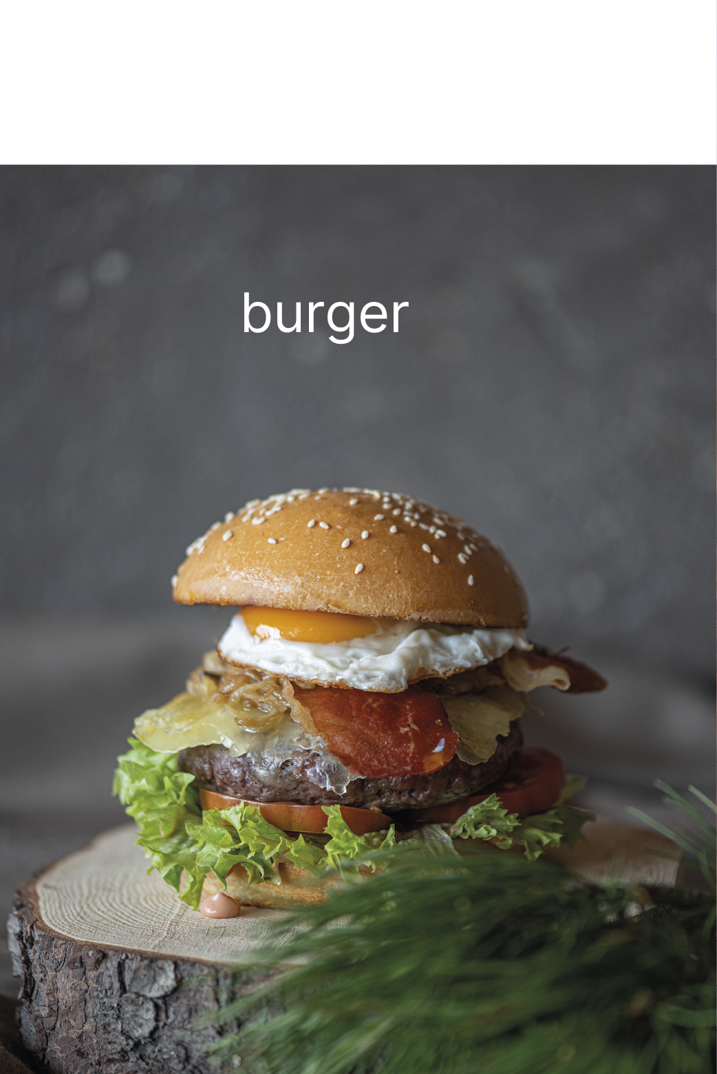 wild o’williams Seiser Alm – der WOW-Burger, eine Eigenkreation von WOW Im Bild sieht man den WOW-Burger auf einer Holzplatte